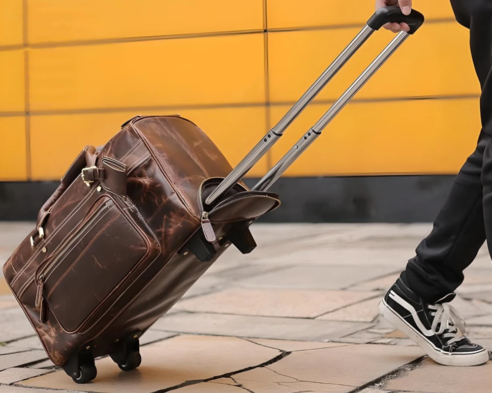 leather carry on bag wheels